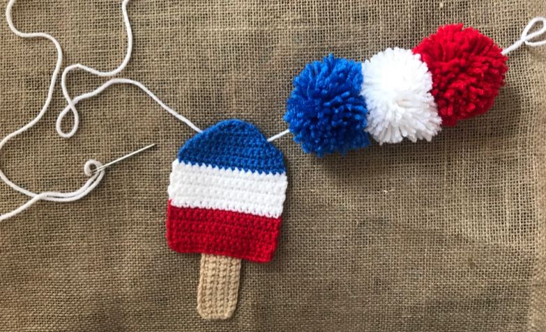 Patriotic Crochet Banner/Coaster Set stringing pom poms and popsicles