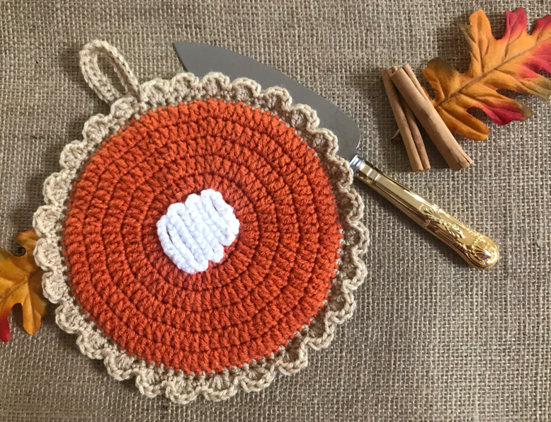 finished photo of hot pad - pumpkin pie crochet hot pad and coasters pattern