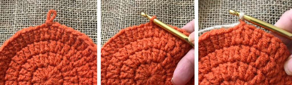 pulling new yarn through join loop of work.
