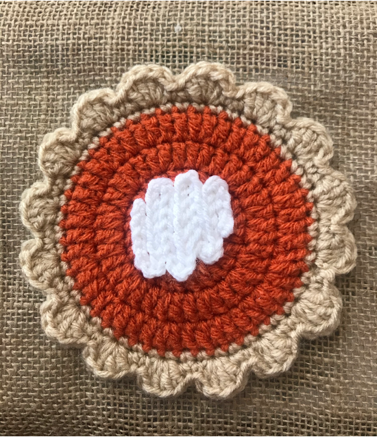 finished and secure coaster whipped cream embellishment - pumpkin pie crochet hot pad and coasters pattern