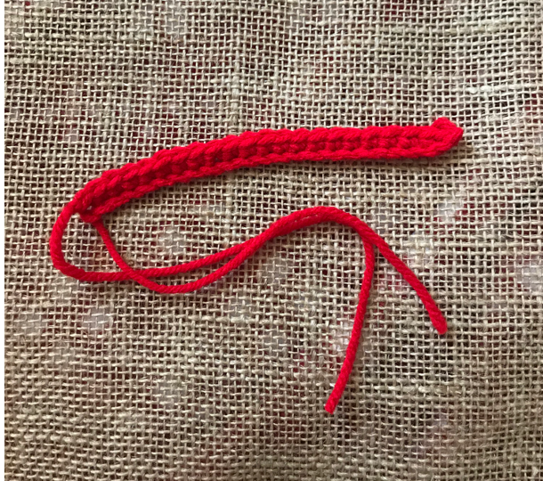 stitched crochet chain for cocoa mug handle.